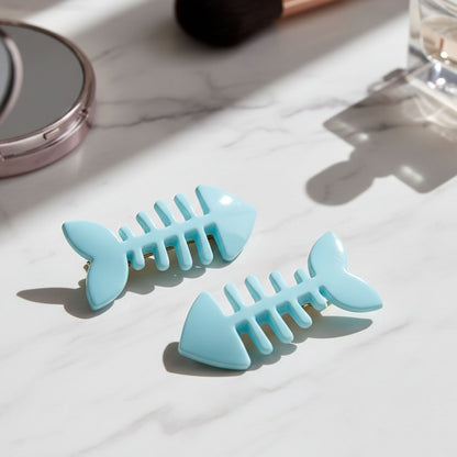 Set of four Wukusy fishbone-shaped bone hair clips, stylish and cute hair accessories for various hairstyles.