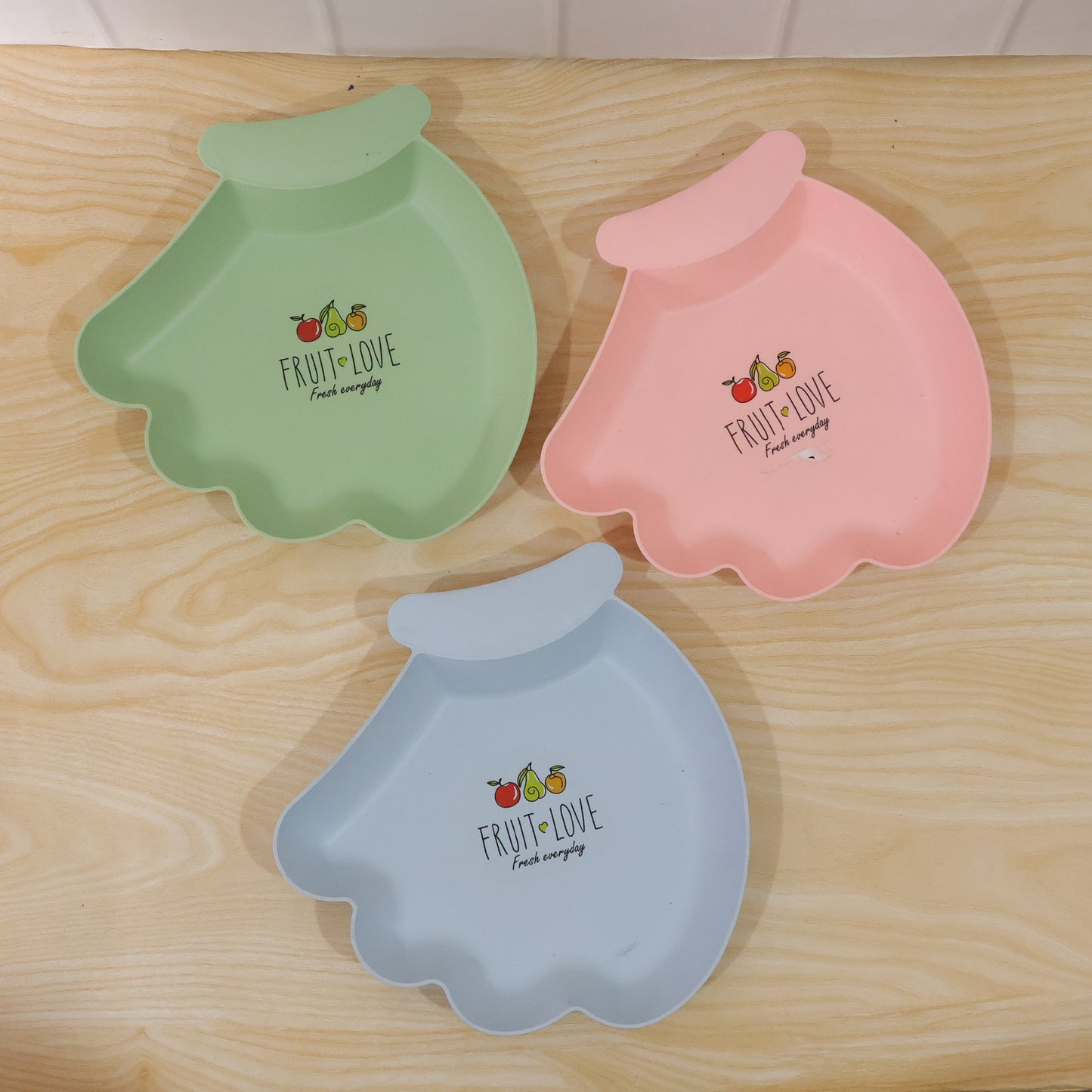 Colorful Wukusy kids serving tray, a cute multi-color plastic tray designed for children’s snacks and drinks.