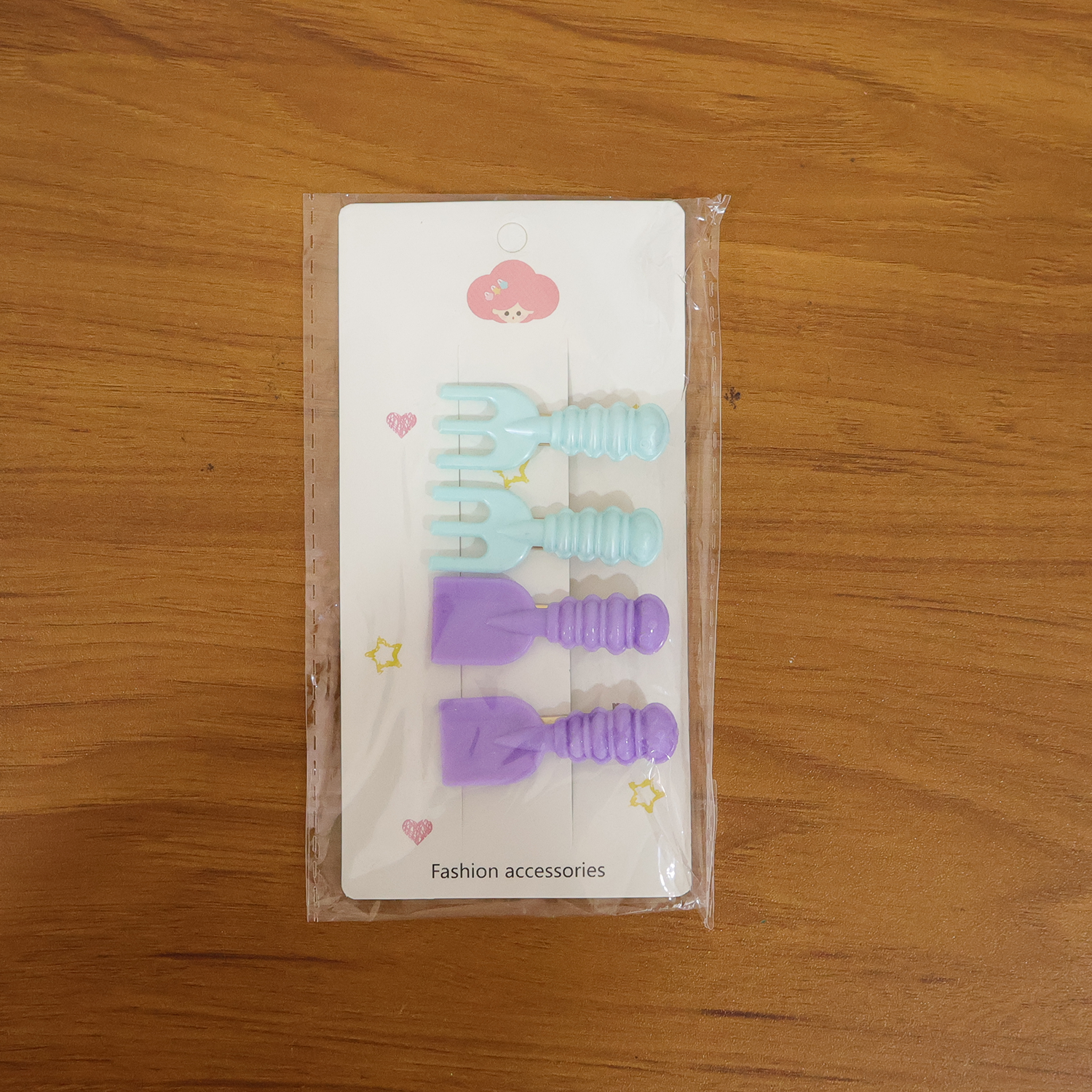 Set of four Wukusy cute mini tool-shaped decorative hair clips, perfect for adding a playful touch to hairstyles.
