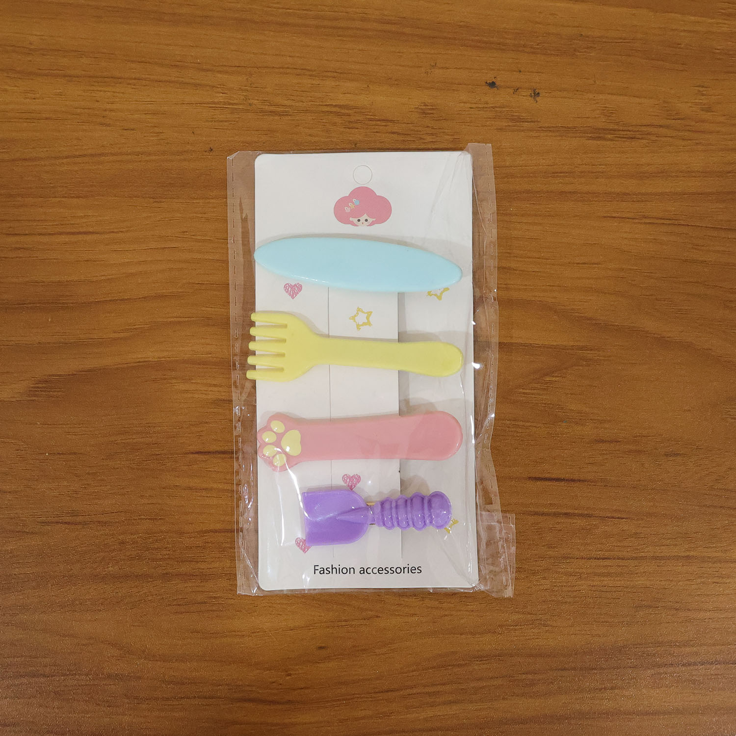 Set of four Wukusy cute multi-design hair clips with colorful patterns, perfect for styling and accessorizing hair.