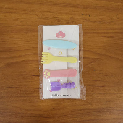 Set of four Wukusy cute multi-design hair clips with colorful patterns, perfect for styling and accessorizing hair.