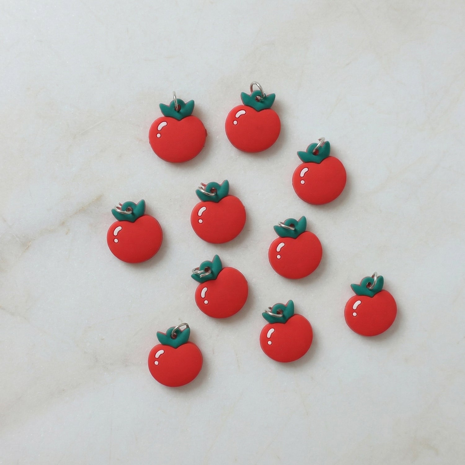 Set of 10 Wukusy red apple-shaped bag charm keychains featuring cute, colorful apple designs for bags or keys.