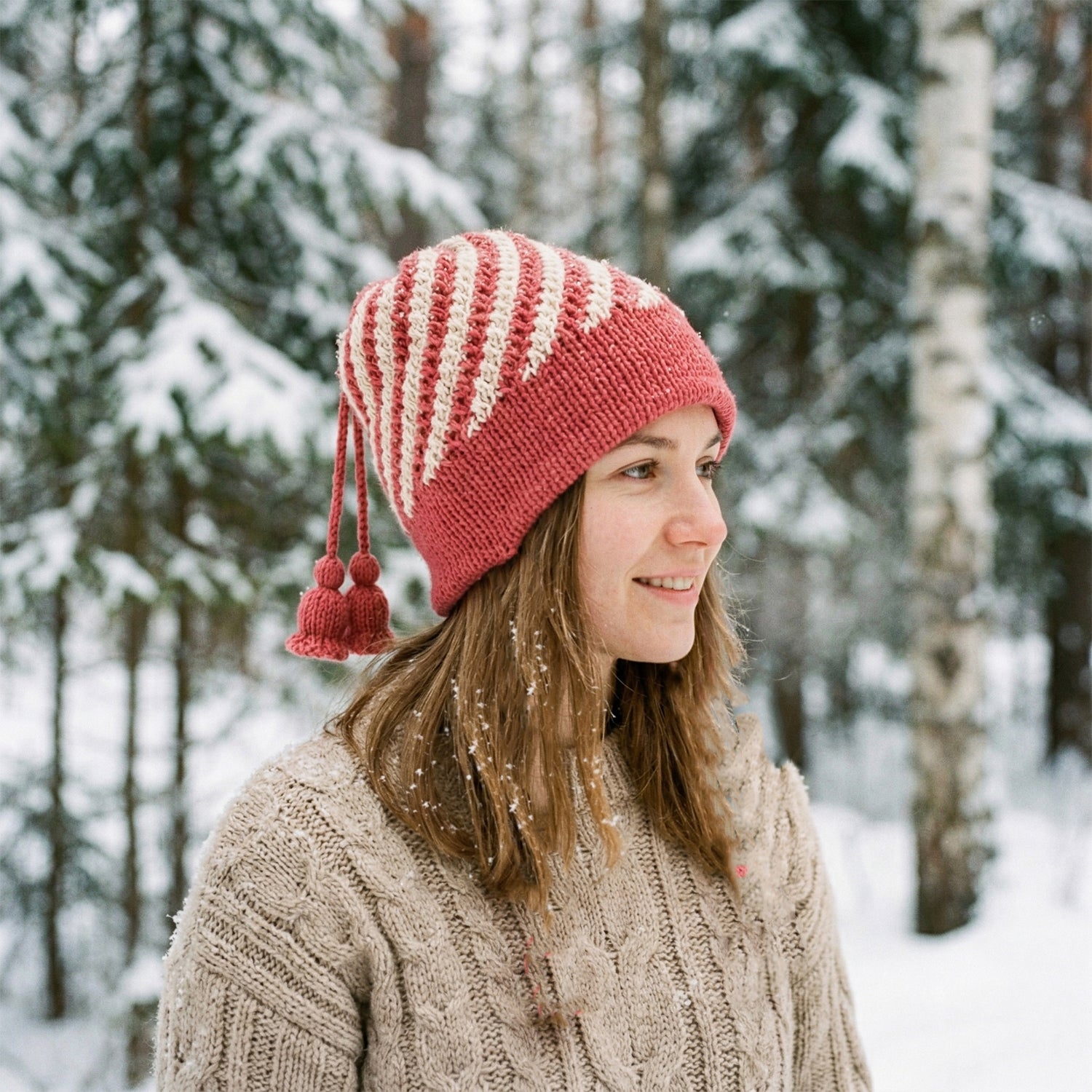 Wukusy winter woolen knitted cap for men and women in a mix of designs, featuring cozy, stylish knit patterns and warm ear coverage.