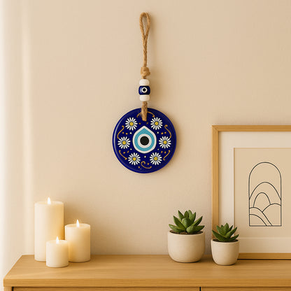 Decorative Evil Eye wall hanging with beads and wind chime, Nazar protector charm by Wukusy for home decor and spiritual protection.
