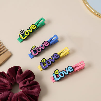 Set of four decorative hair clips by Wukusy, featuring stylish and colorful designs for versatile hair accessories.