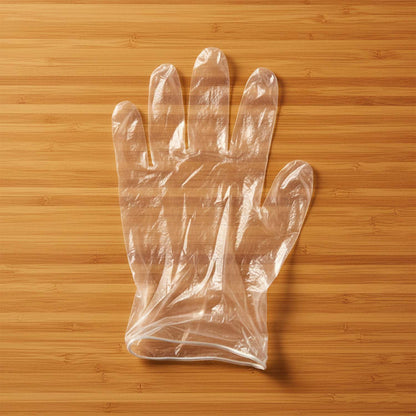 Disposable clear gloves by Wukusy, 50-pack, showing transparent, lightweight gloves suitable for hygiene and protection.