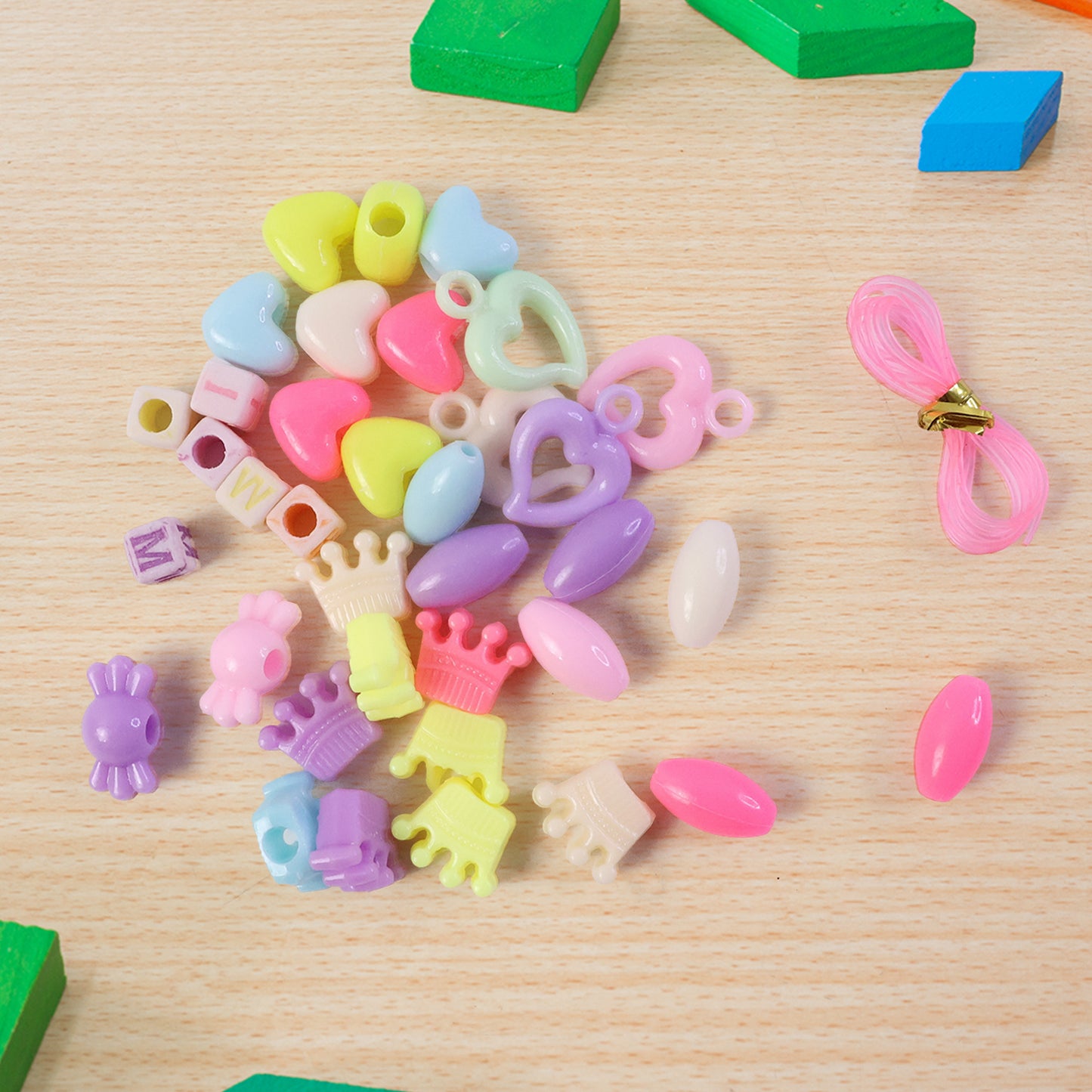 Wukusy DIY fashion beading jewelry making kit with beads, charms, and tools for creating custom jewelry.