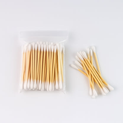 Eco-friendly wooden cotton ear buds from Wukusy, 1 packet of approximately 100 pairs, with natural wooden and cotton tips.