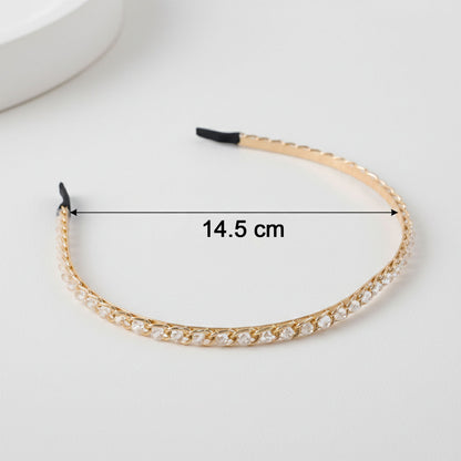 Elegant crystal-studded metal hair band by Wukusy, featuring sparkling embellishments and a sleek design for stylish hair accessory.