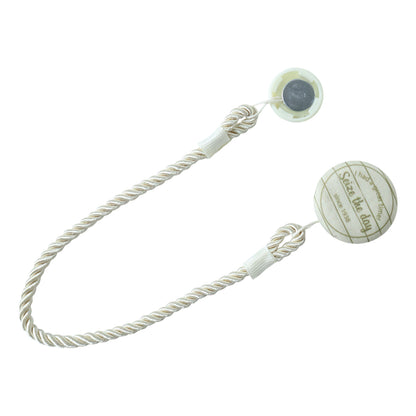 Elegant Wukusy magnetic curtain tieback, featuring a decorative design to hold curtains open with ease and style.