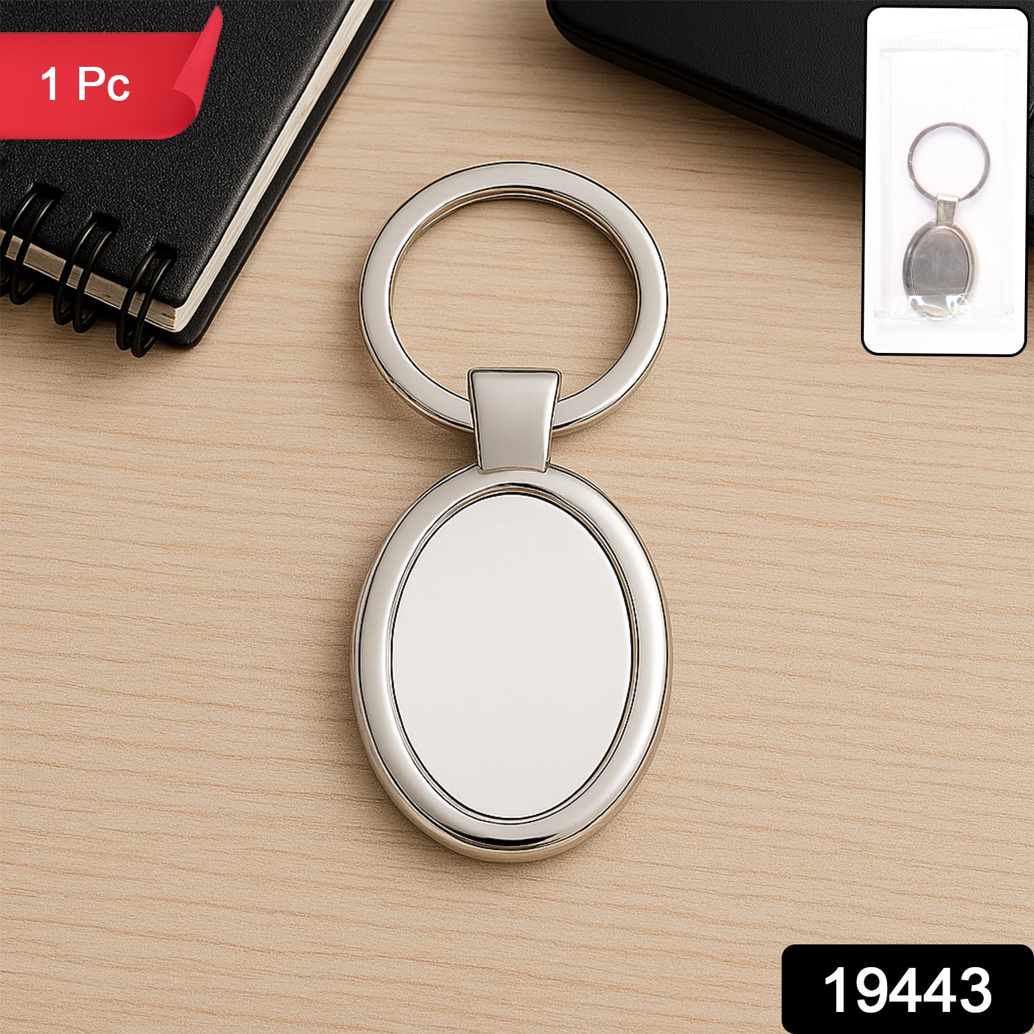 Elegant oval-shaped metal keychain by Wukusy, featuring a sleek design for personal use and everyday carrying.
