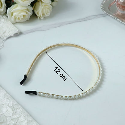 Elegant Wukusy pearl beaded slim golden metal hair band featuring delicate pearl accents, perfect for stylish hairstyles.