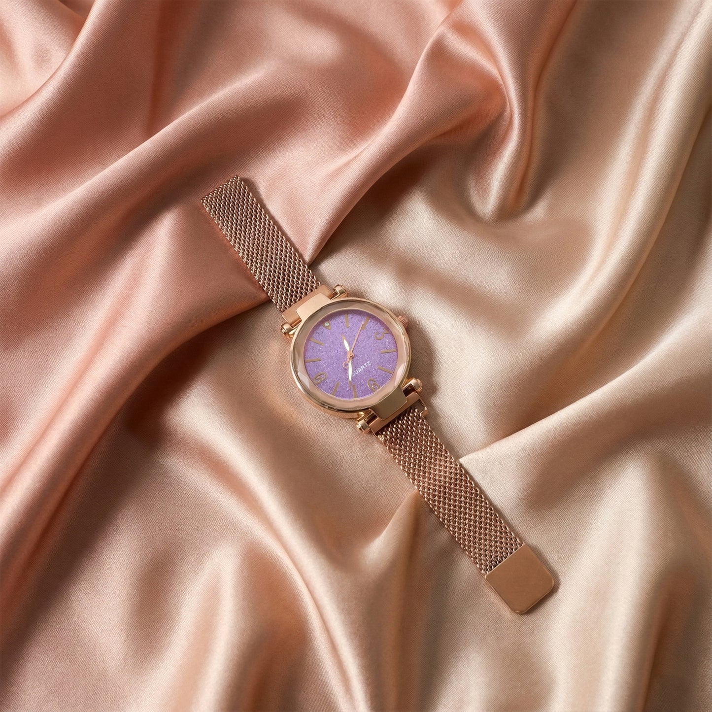 Elegant rose gold mesh strap analog wrist watch for women by Wukusy, featuring a sleek design and classic time display.
