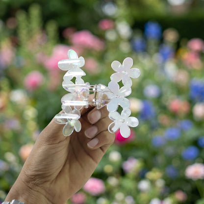 Elegant transparent floral hair claw clip by Wukusy, showcasing a delicate design perfect for securing hair.