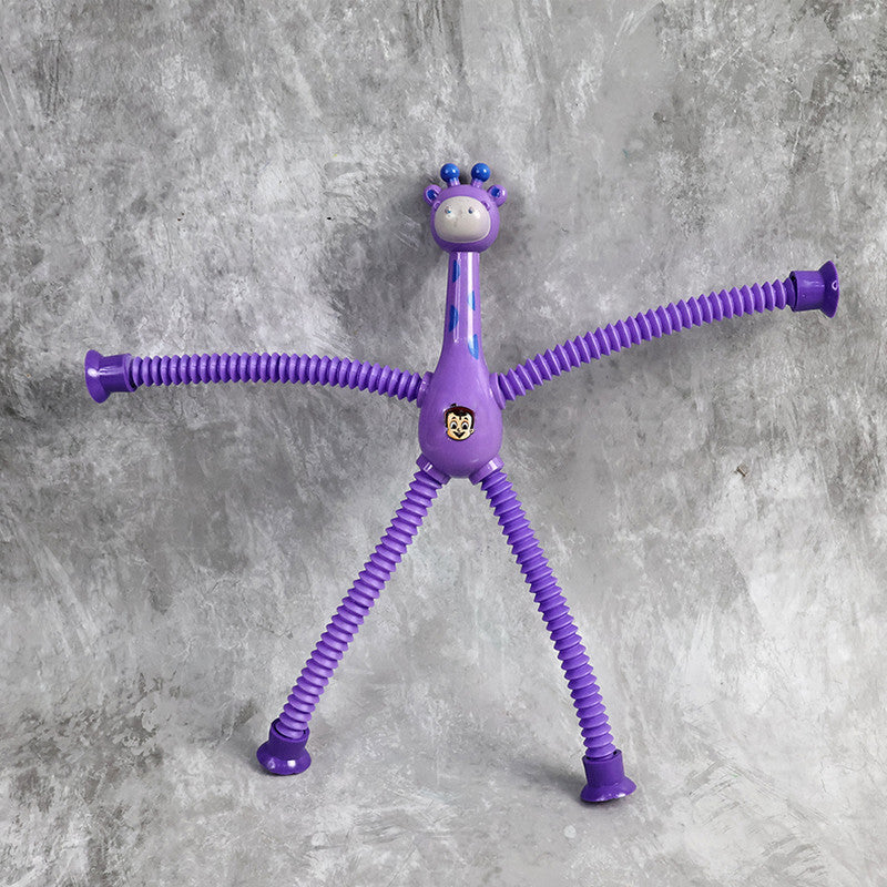 Flexible giraffe-shaped magic spring toy by Wukusy, colorful and springy, ideal for fun and sensory play.