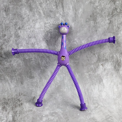 Flexible giraffe-shaped magic spring toy by Wukusy, colorful and springy, ideal for fun and sensory play.