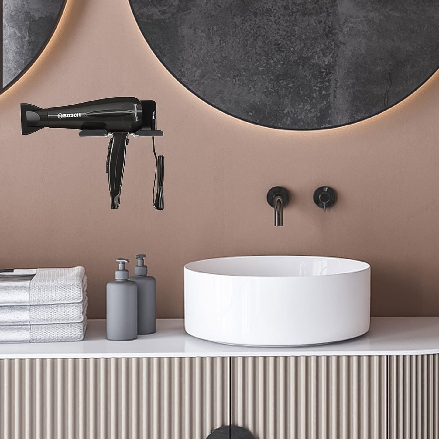 Wall-mounted Wukusy plastic hair dryer holder organizer rack for bathroom and bedroom, keeps blow dryer and hair tools neatly stored.