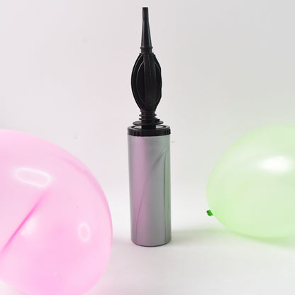 Wukusy hand balloon pump, 24 cm, compact manual air pump for inflating balloons, shown in a close-up image.