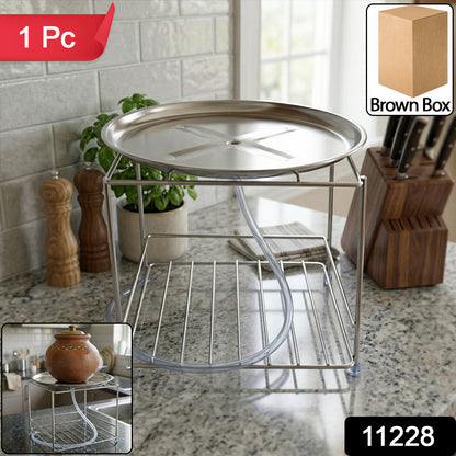 Wukusy heavy-duty stainless steel multipurpose utensils stand holding various kitchen utensils on a countertop