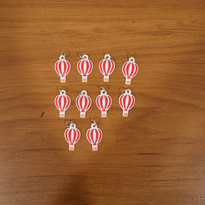Wukusy hot air balloon bag charm keychain set with 10 colorful balloon designs on keychains for bags and accessories.