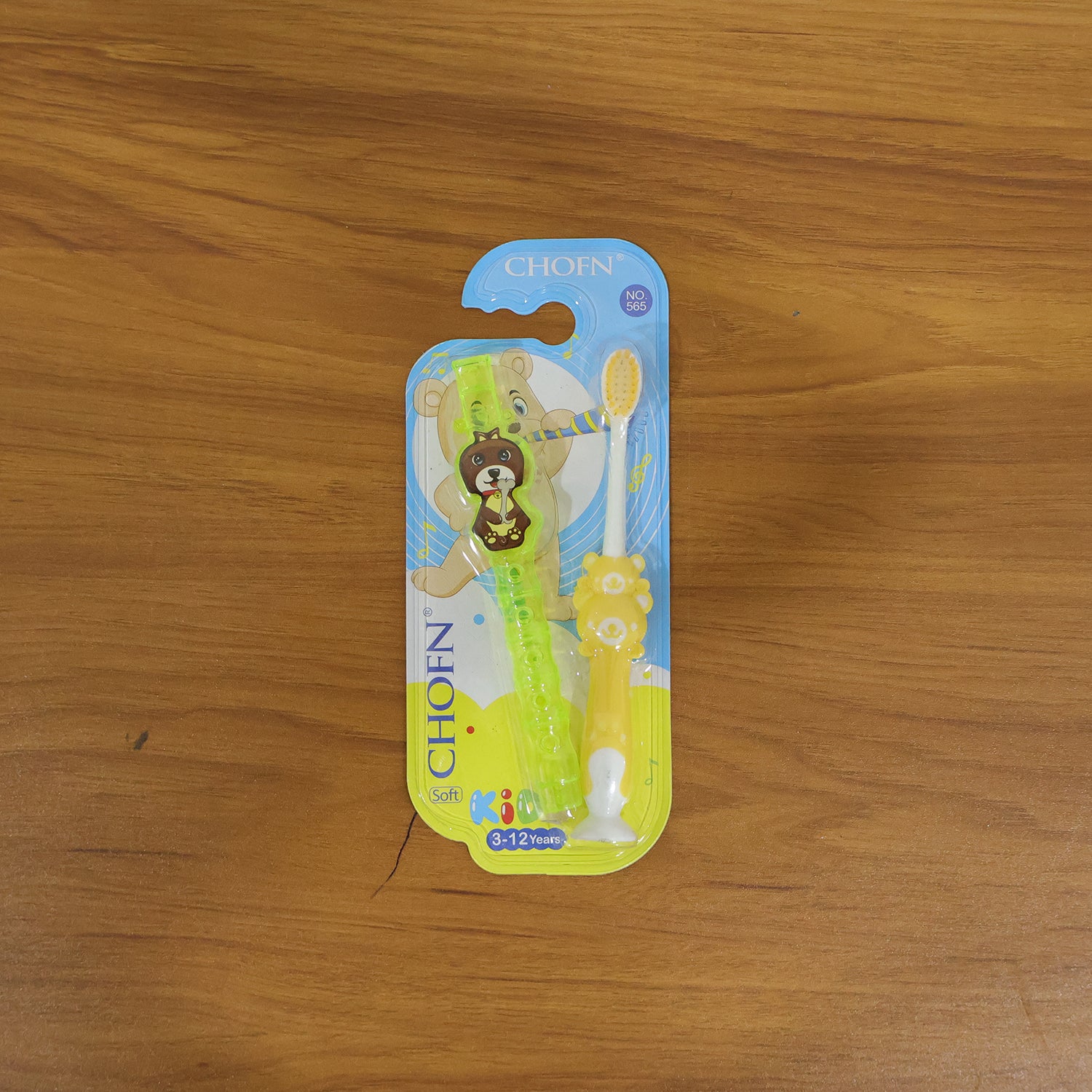Kids cartoon design toothbrush with musical whistle set by Wukusy, featuring colorful handles and playful characters in a 2-piece set.