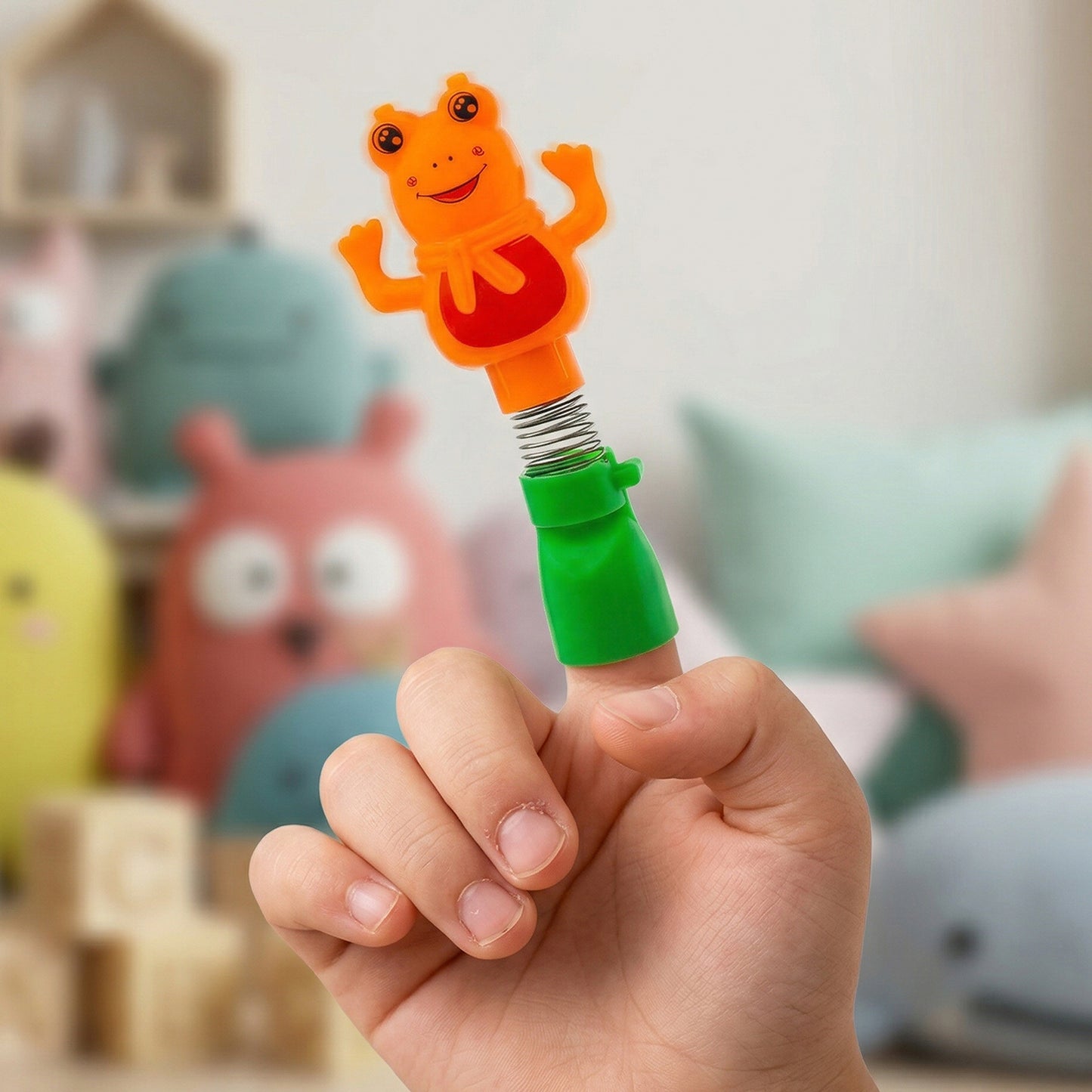 Kids cartoon spring frog toy and toothbrush set by Wukusy, colorful and playful 2-piece dental care toy for children.