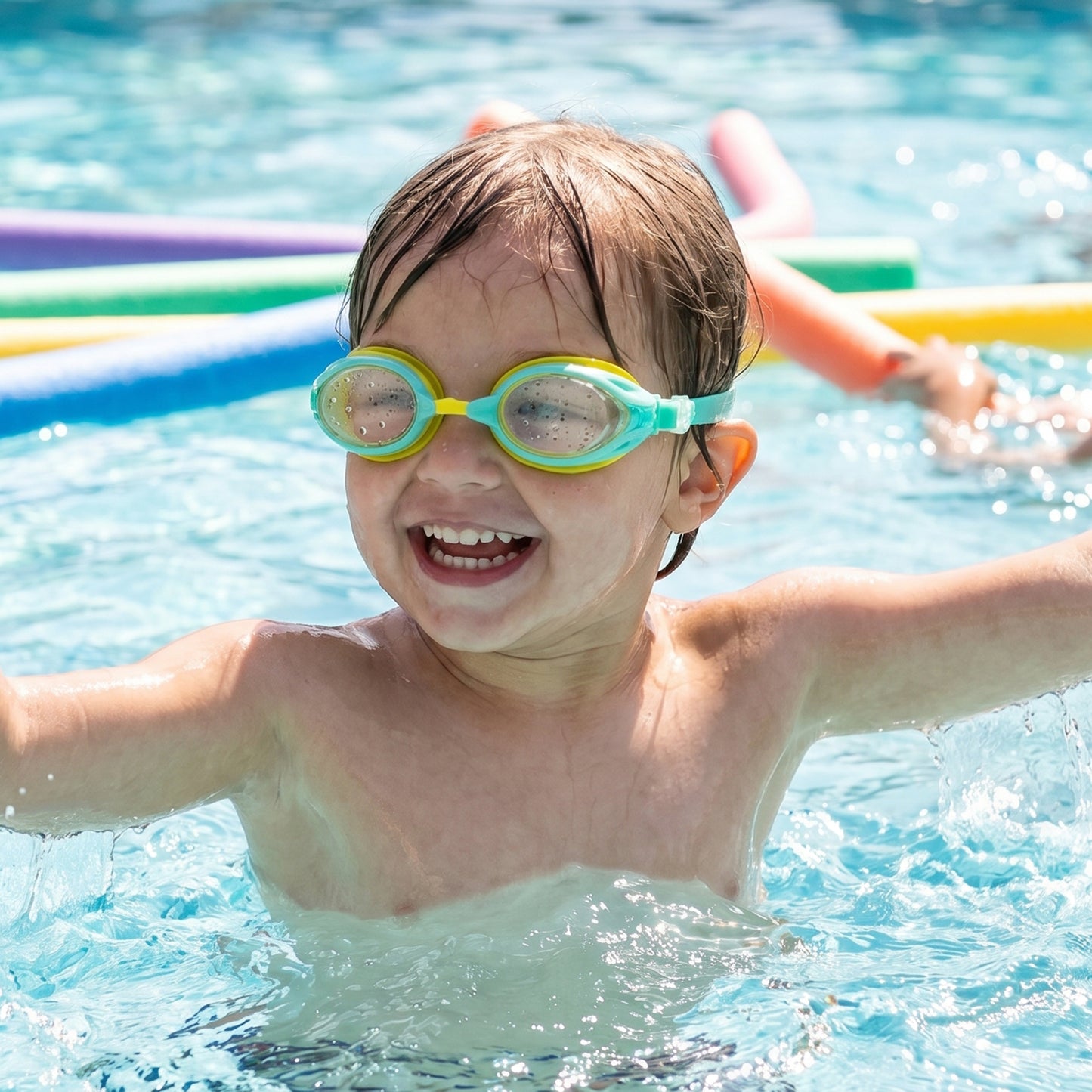Kids dual color swimming goggles with clear vision lenses and comfortable fit, designed by Wukusy for young swimmers.