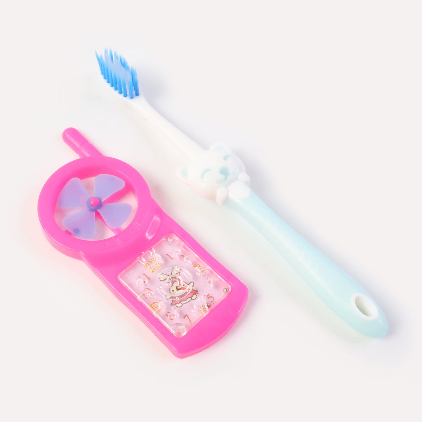 Kids toothbrush and fan toy set by Wukusy featuring colorful toothbrush and playful fan toy for children.