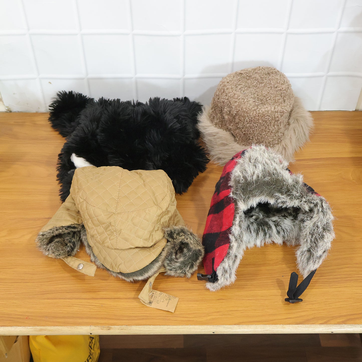Kids winter fur-lined warm cap with ear flaps and stylish design by Wukusy, featuring a cozy, fashionable look for cold weather.