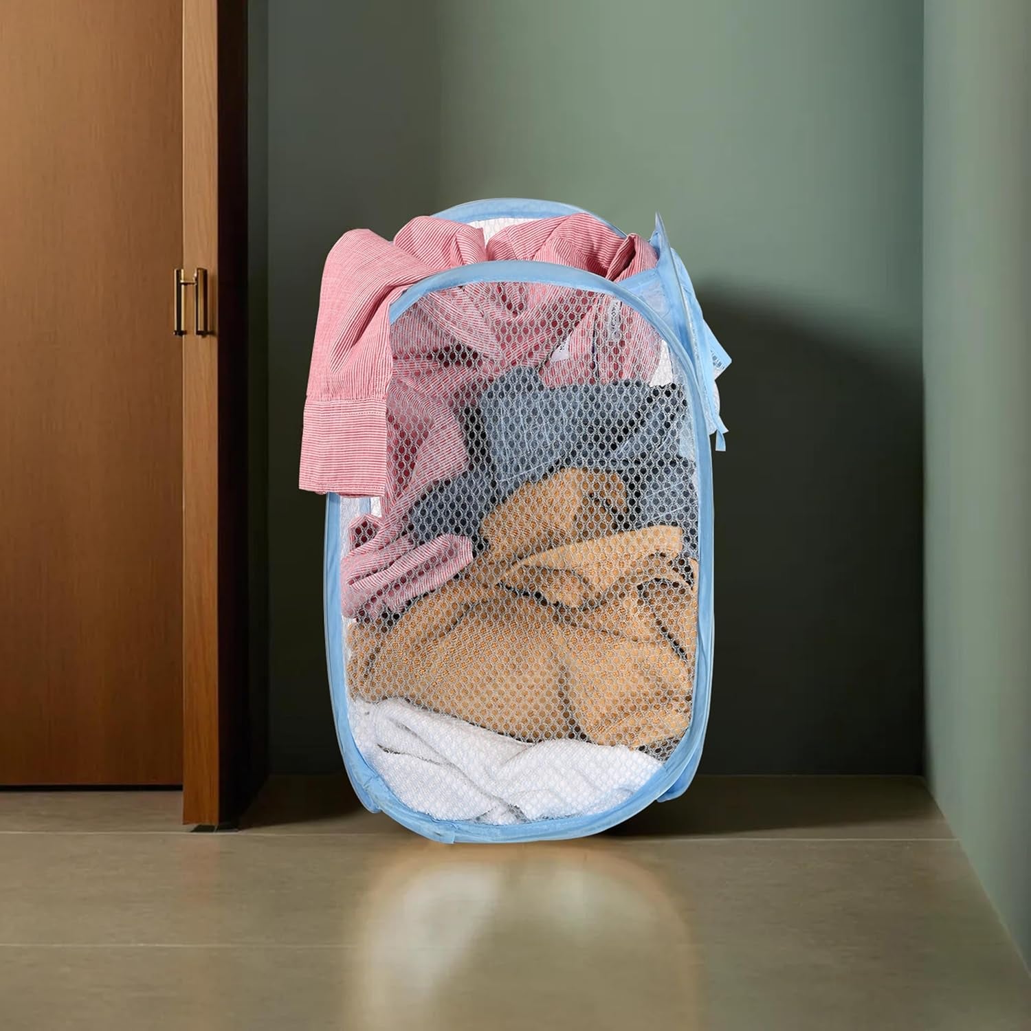 Large Wukusy mesh pop-up laundry basket with handles, 54x30cm, for clothes storage and organization.