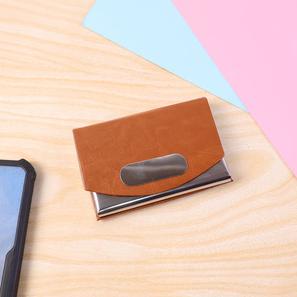 Leather and stainless steel business card holder by Wukusy, compact design with sleek finish for professional card organization.