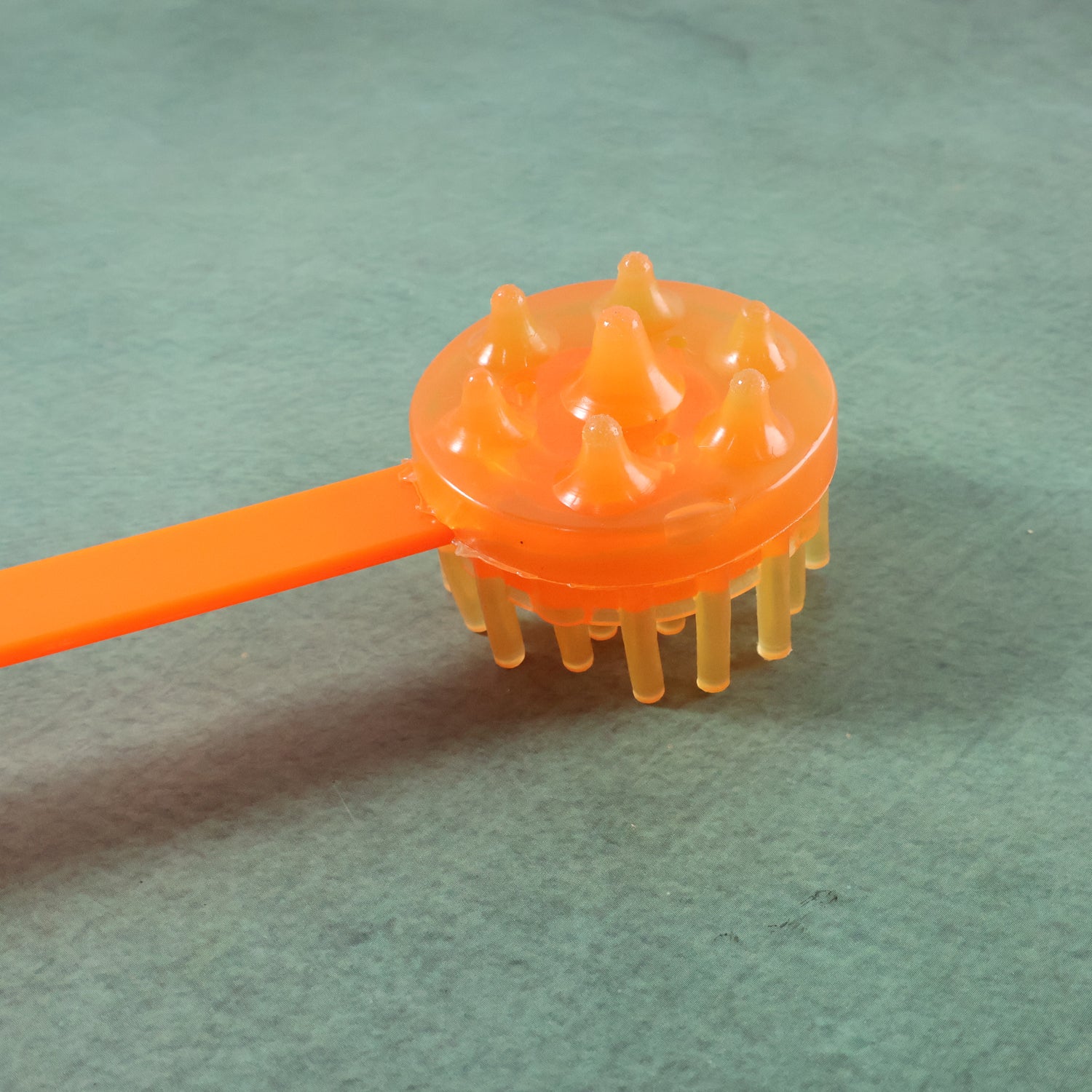 Wukusy long handle body massage roller stick for muscle relaxation and deep tissue massage, single piece.