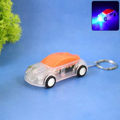 Wukusy mini car shape LED keychain light with random color, compact and portable keychain accessory for keys or bags.