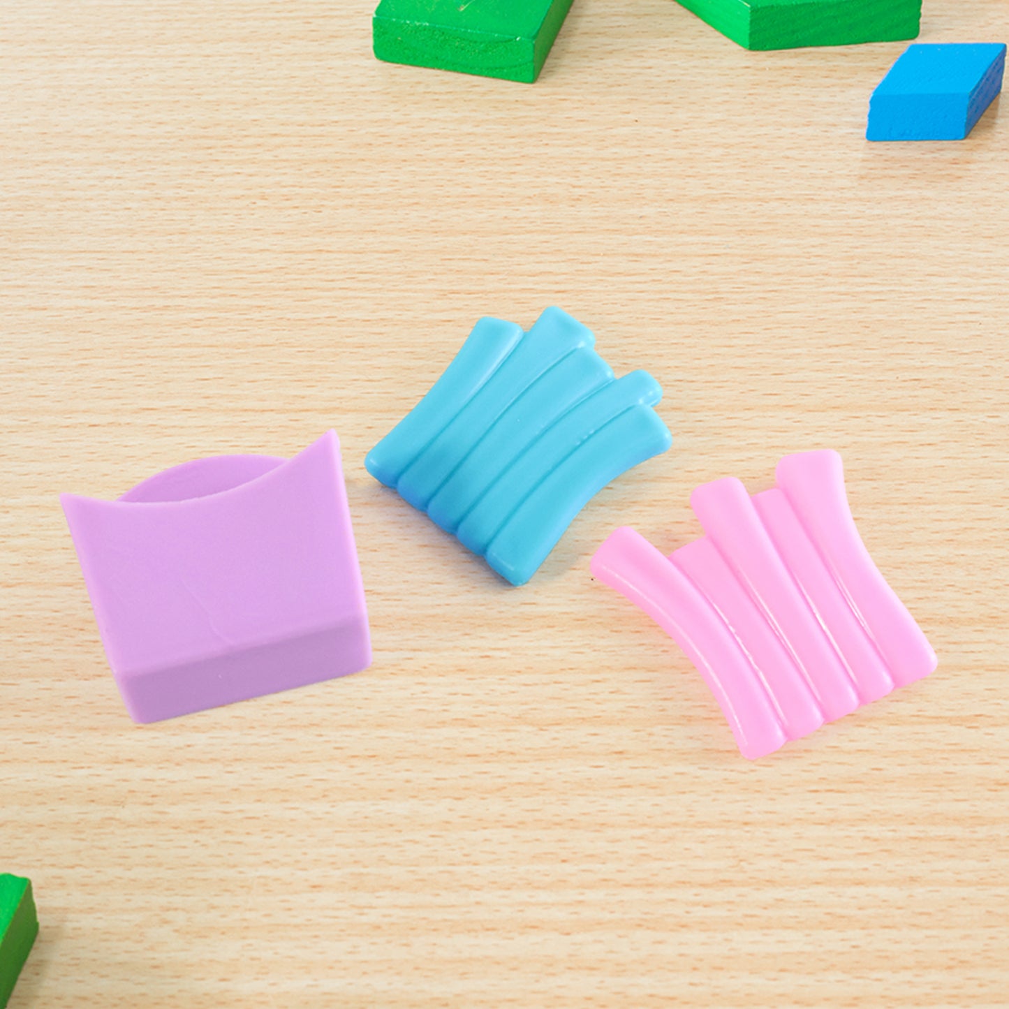Mini French fries toy set by Wukusy featuring realistic-looking foam fries and a small container for imaginative play.