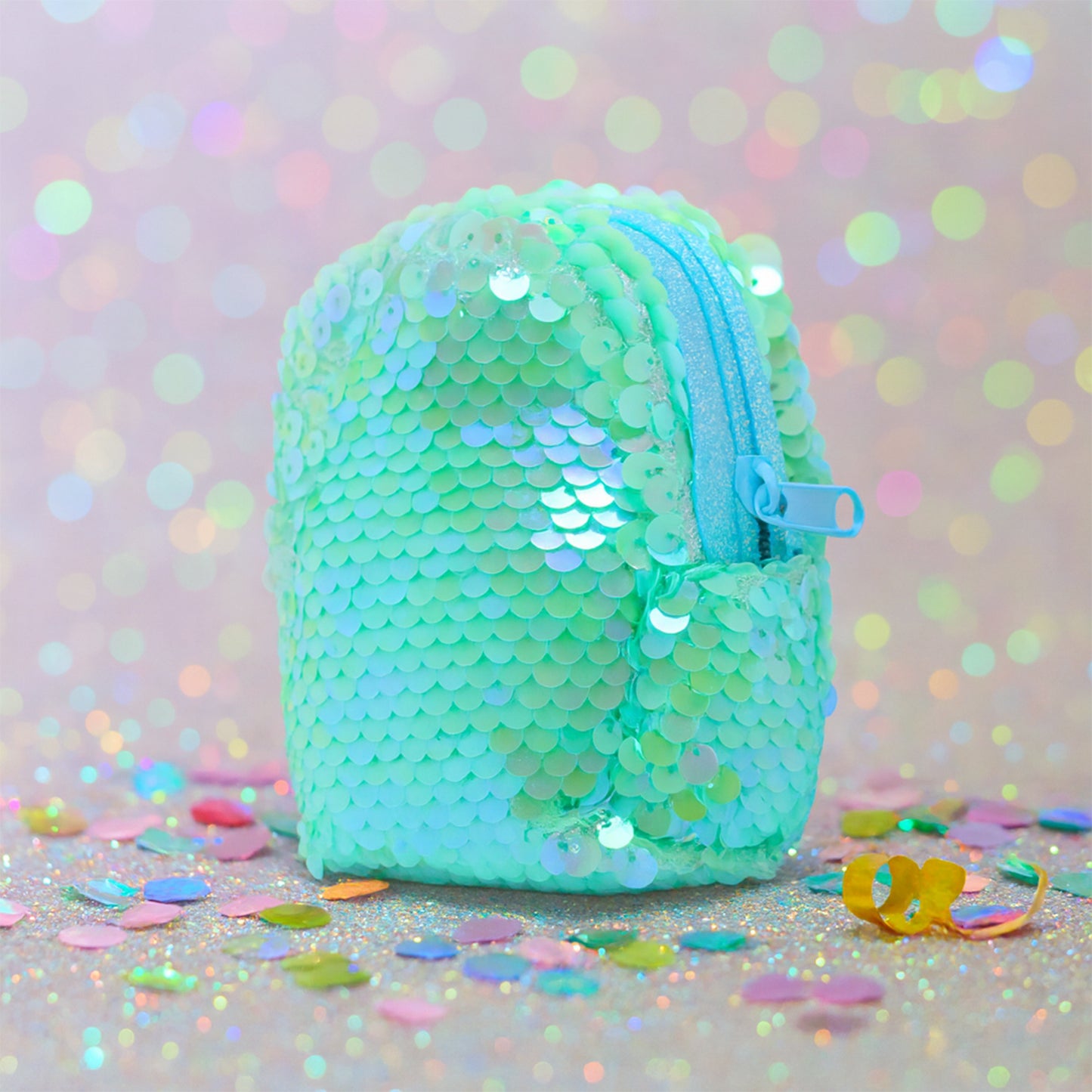 Mini sequin zipper pouch by Wukusy, showing shiny sequins and a secure zipper closure, perfect for small accessories or coins.