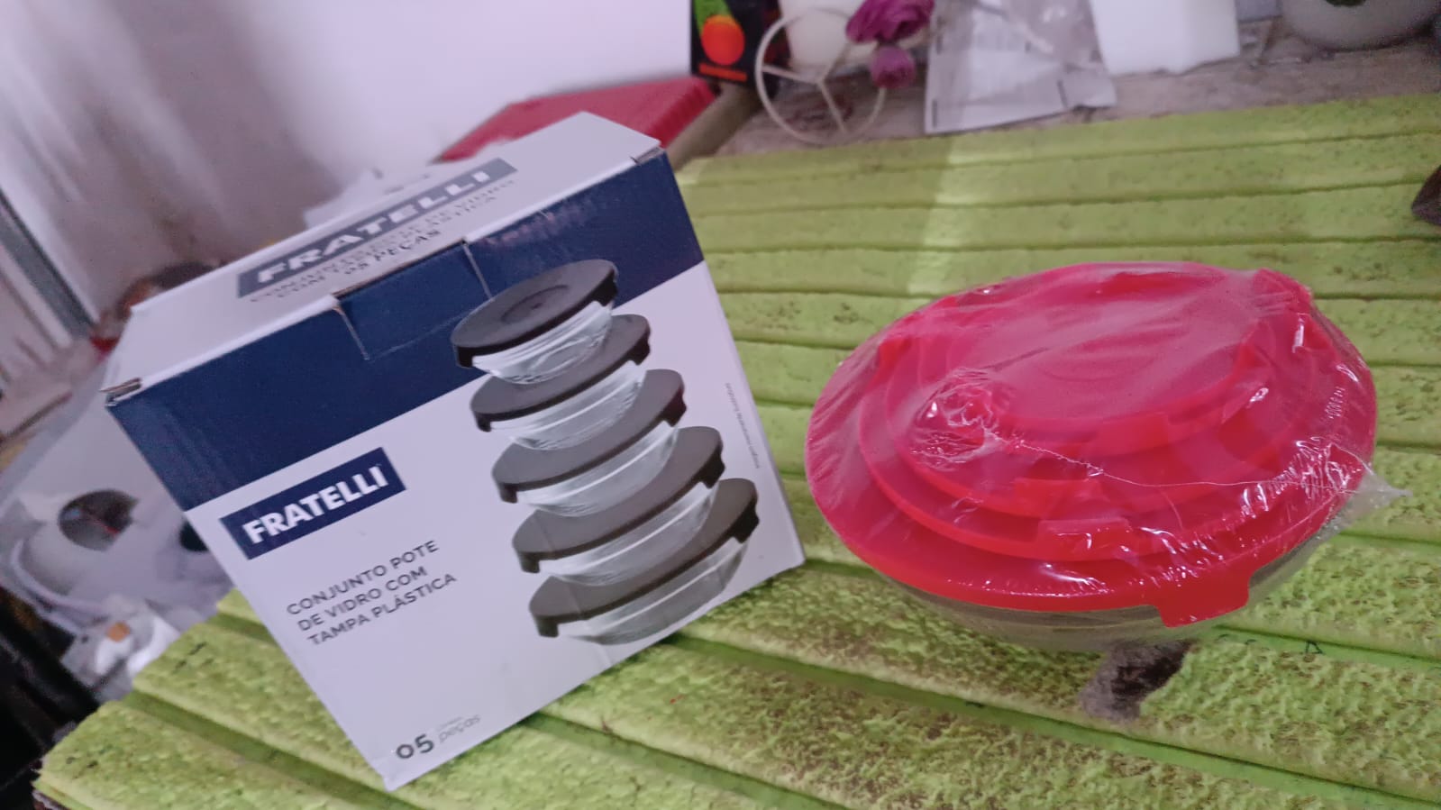 Set of five Wukusy modern glass mixing and storage bowls with red lids, ideal for kitchen organization and food prep.