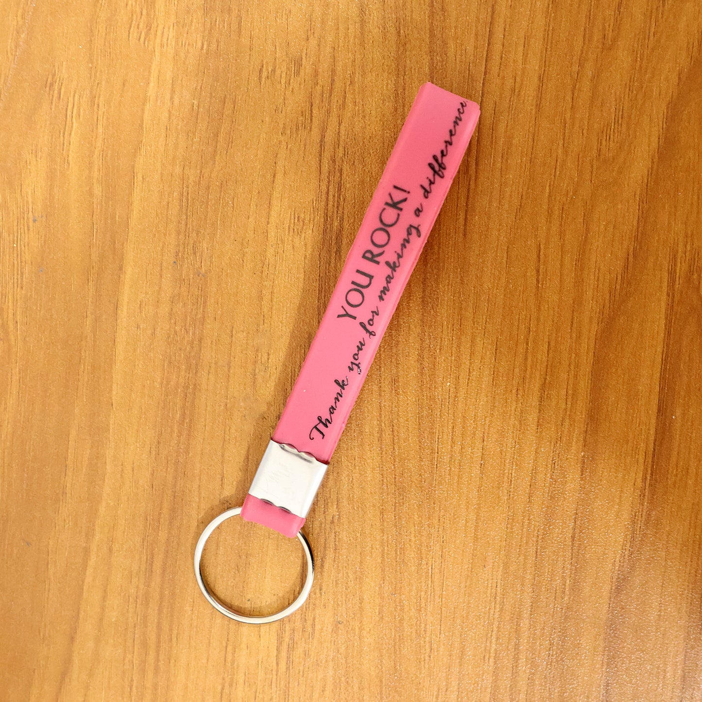 Wukusy motivational silicone wrist strap keychain in mixed colors, featuring inspirational design and durable silicone material.