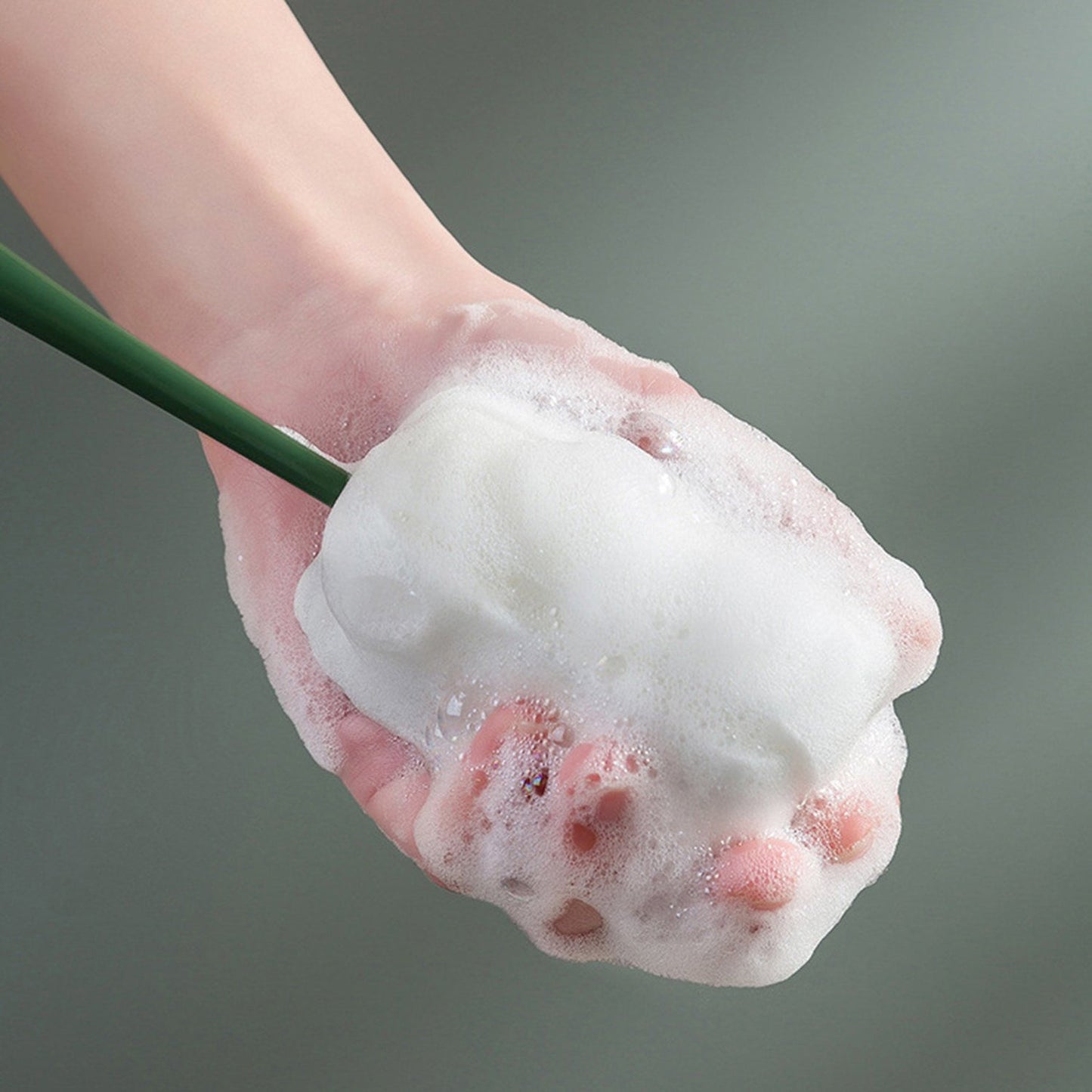 Wukusy multifunctional silicone bottle cleaning foam brush with plastic long handle for thorough cleaning of bottles and jars.