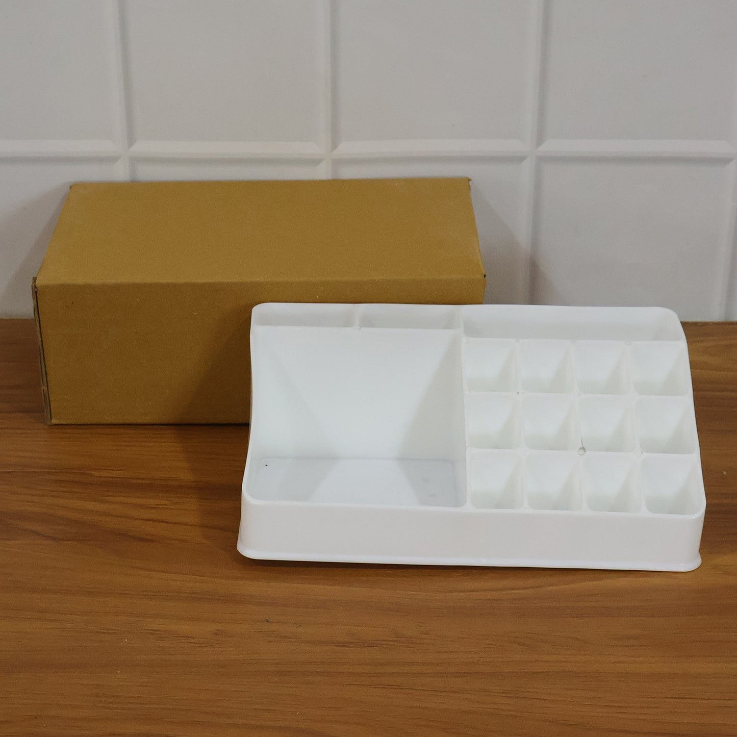 Wukusy multipurpose makeup organizer storage box with compartments for cosmetics and beauty tools on a white background.