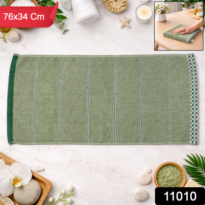 Soft cotton bath towel by Wukusy, 76x34 cm, versatile and plush for drying and relaxing after bath or shower.