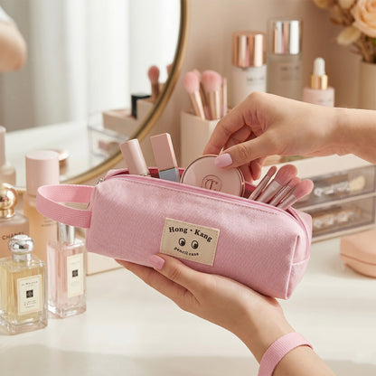 Wukusy multipurpose zipper pouch organizer for cosmetics and small items, with a durable fabric exterior and secure zipper closure.
