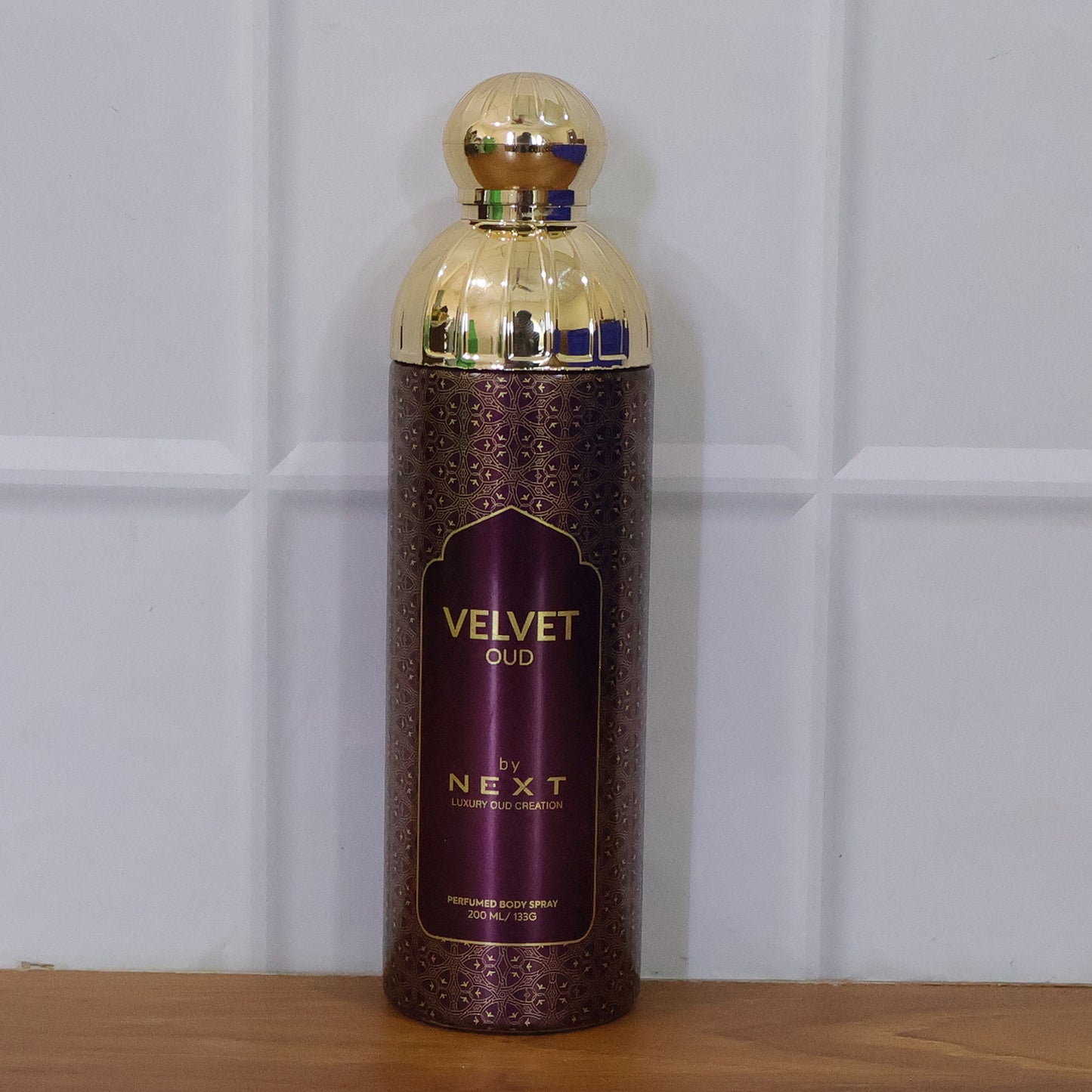 Wukusy Next Velvet Oud Premium Perfumed Body Spray 200ml bottle with a sleek design and luxurious fragrance label.