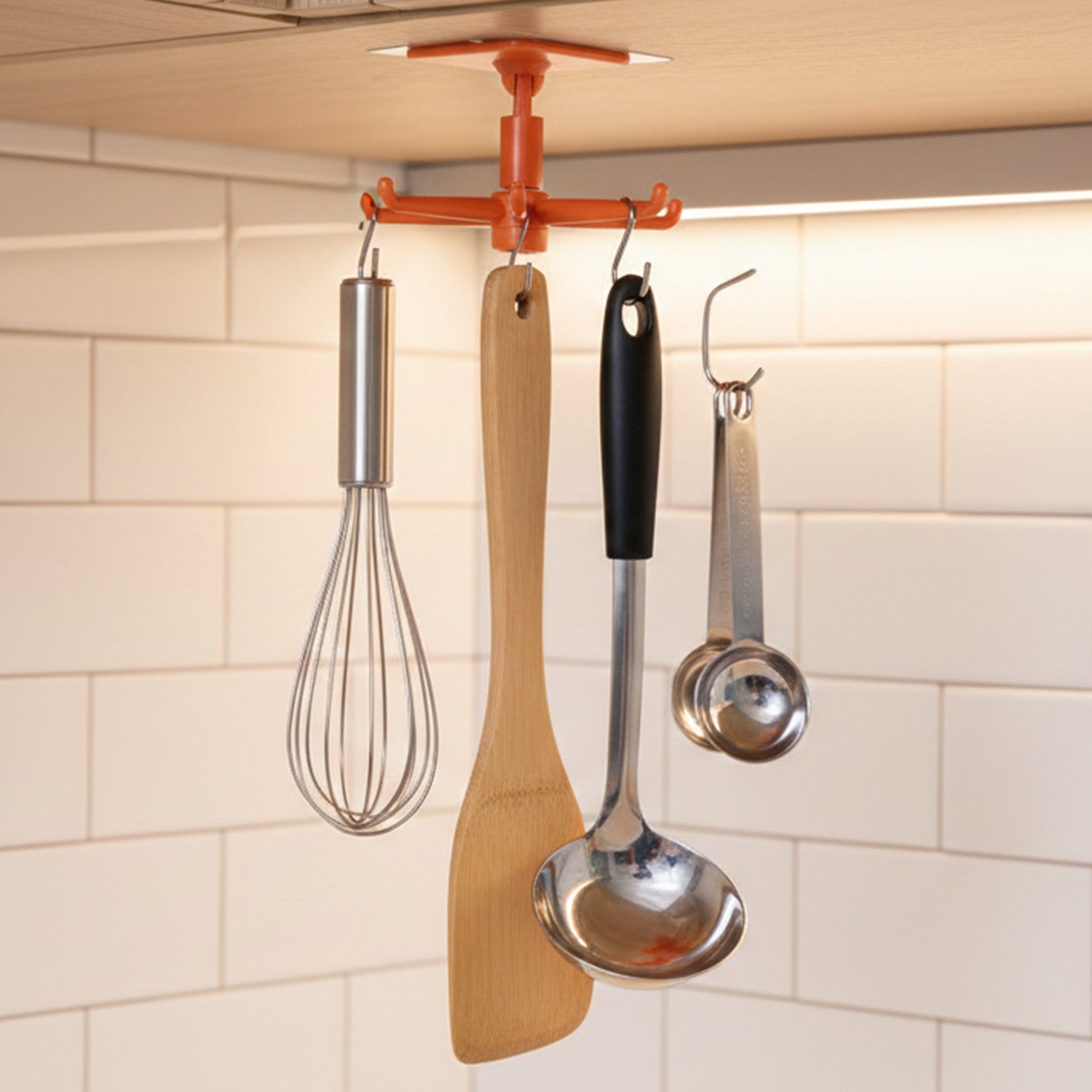 Orange 360 rotating wall-mounted kitchen utensils hook stand by Wukusy, designed for organizing utensils in the kitchen.