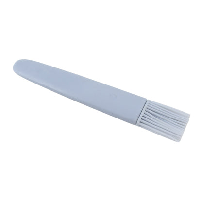 Wukusy silicone pastry and basting brush for BBQ sauce, marinade, and oil application on meat and baked goods.