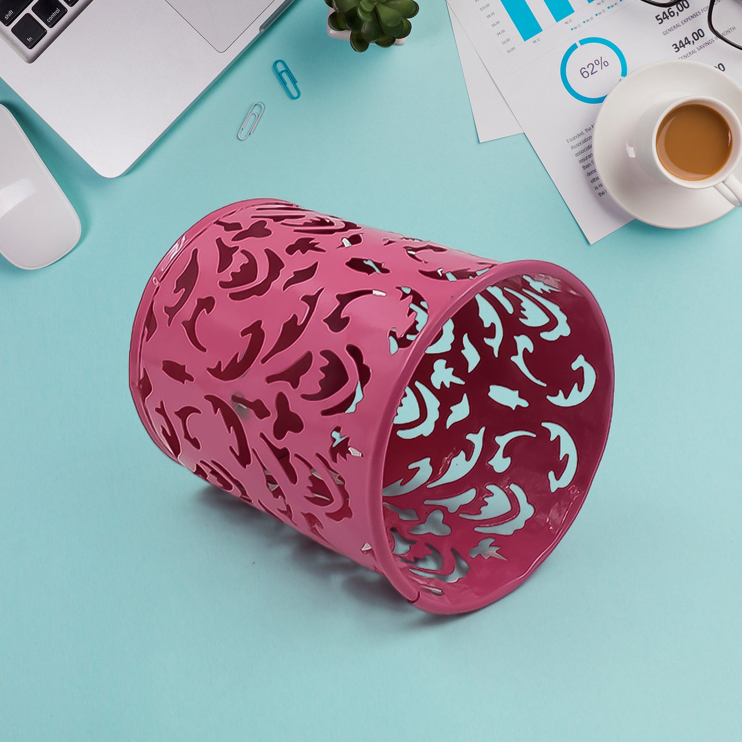 Wukusy metal mesh pen holder on office desk for organizing pens and stationery in a sleek desk accessory.