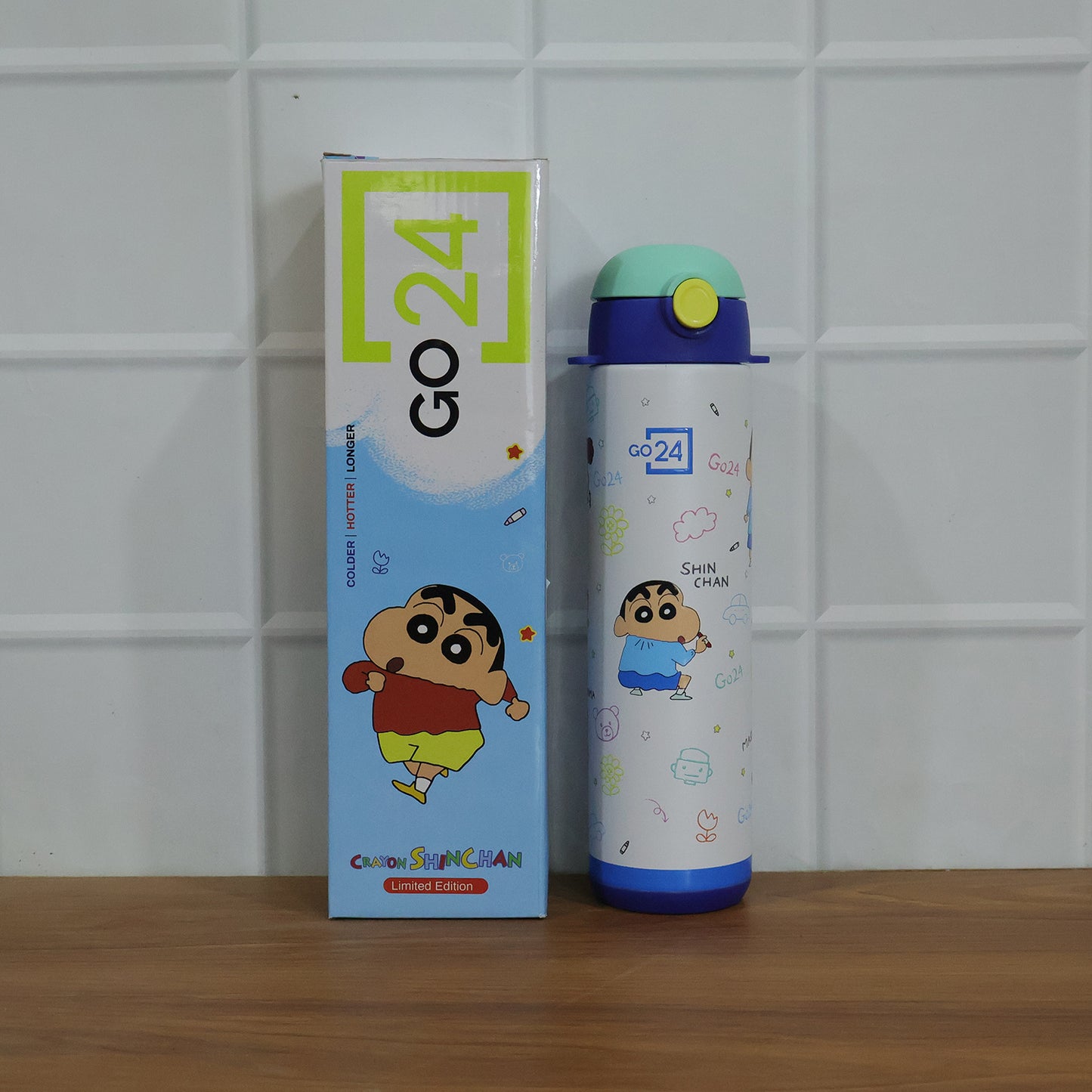 Wukusy Pexpo Kids School stainless steel water bottle, 500ml capacity, with a colorful lid and child-friendly design.