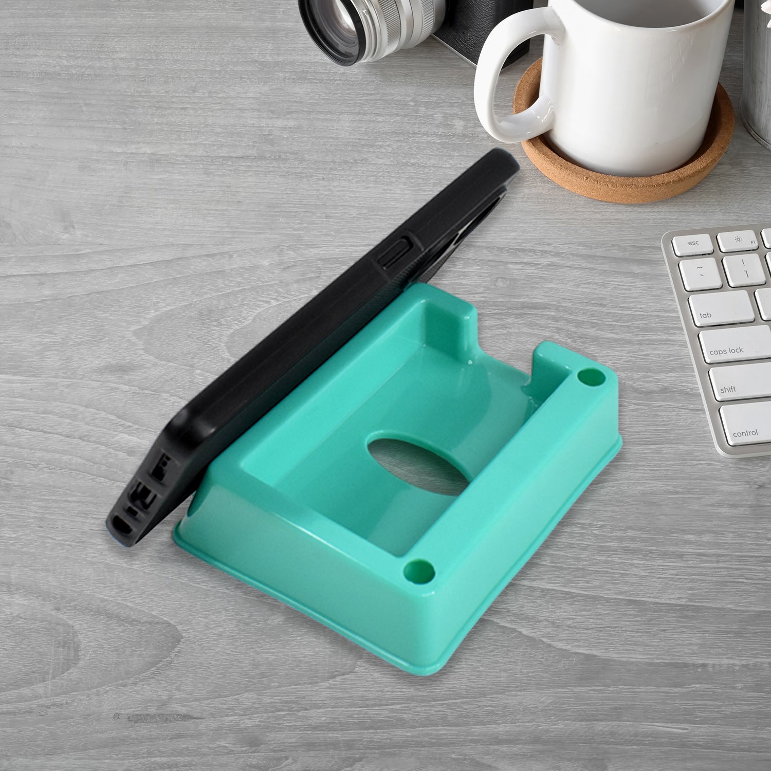 Set of four Wukusy plastic mobile phone stand holders showing different angles and colors for hands-free device support.