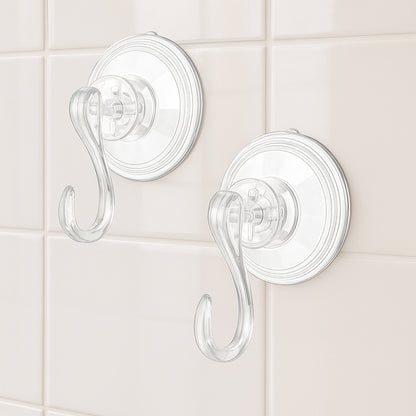 Set of four Wukusy plastic suction cup hooks attached to a smooth surface for hanging items in bathroom or kitchen.