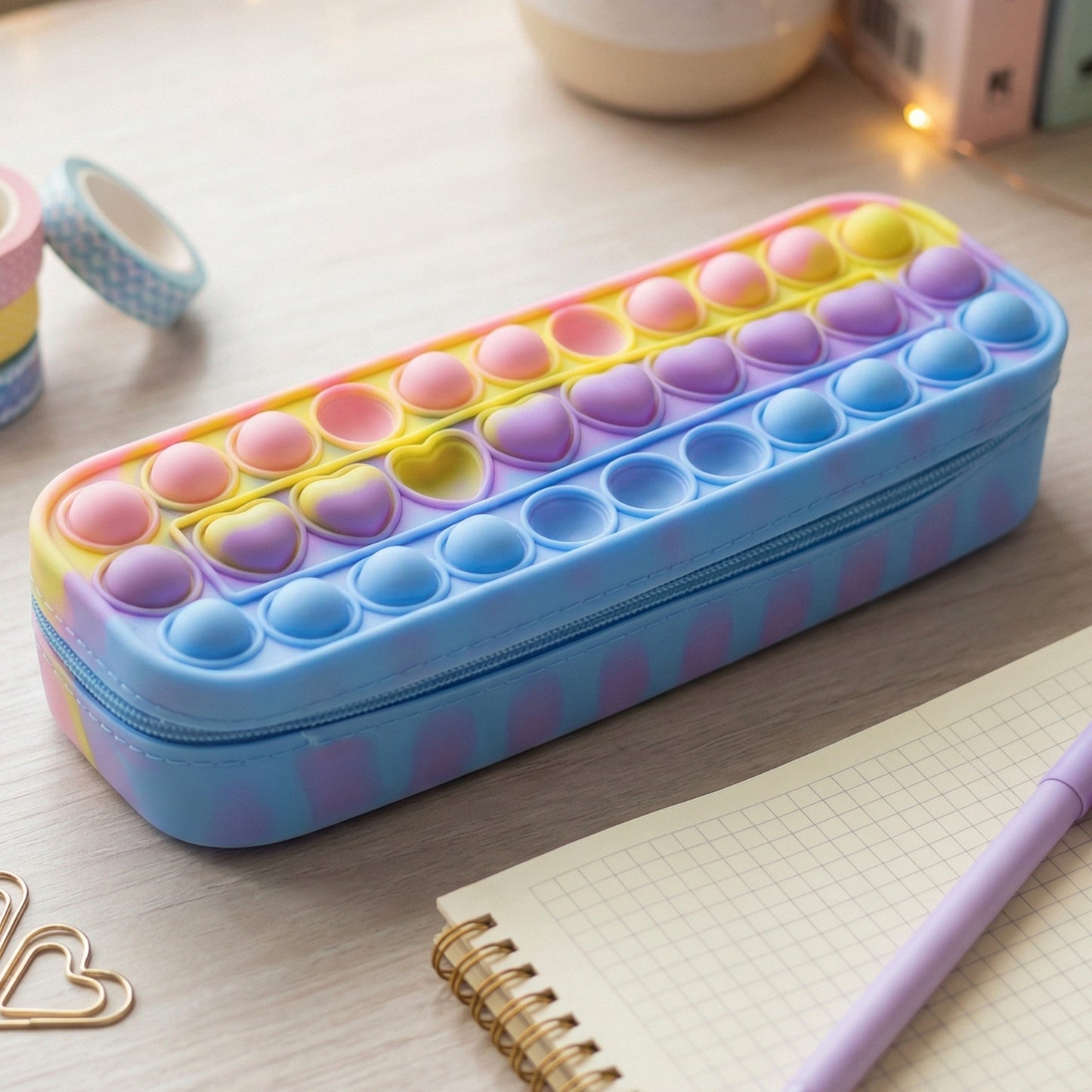 Wukusy Pop It silicone pencil pouch with zipper, colorful and flexible storage case for pens and stationery.