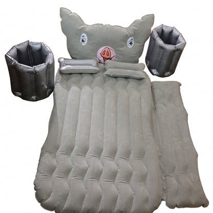 Wukusy portable car air mattress set with pig pillow and cushions, designed for travel comfort in a vehicle.